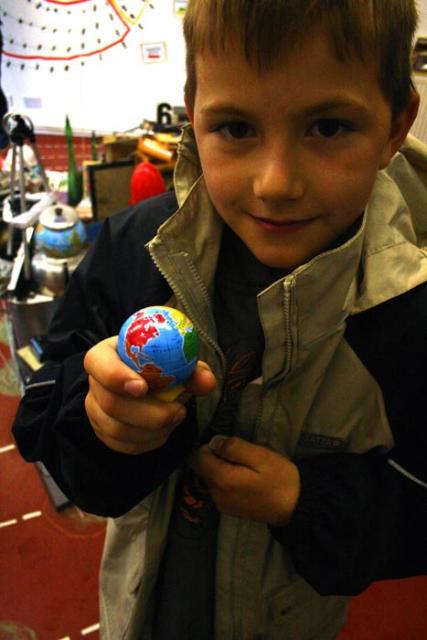 Kid with globe